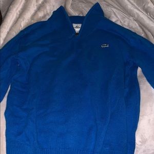 A Lacoste pullover.